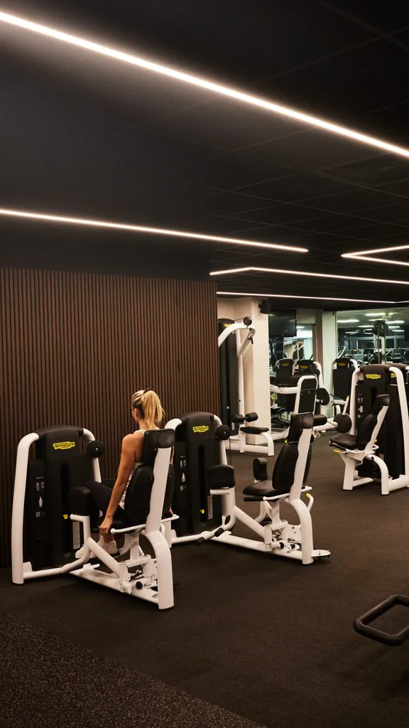 Someone using a gym machine at The Wrightington Hotel Health Club
